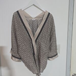 This Brunello Cucinelli Shirt is crafted in Italy from 100% silk.